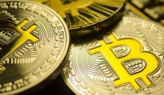 特斯拉可以用比特币支付吗(特斯拉或许将支持比特币付款究竟什么是比特币)